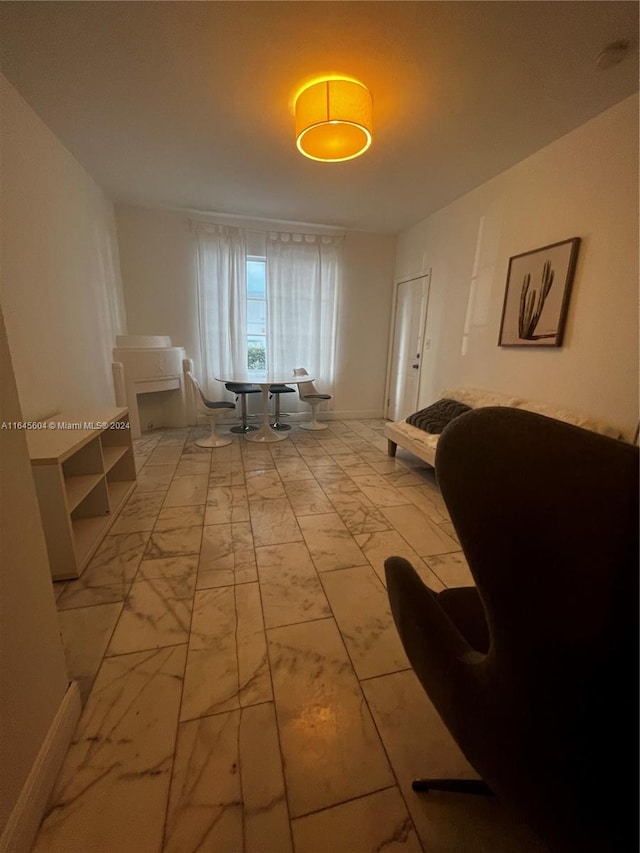 interior space featuring light tile patterned floors