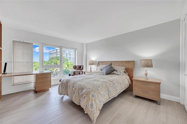 bedroom featuring light hardwood / wood-style floors