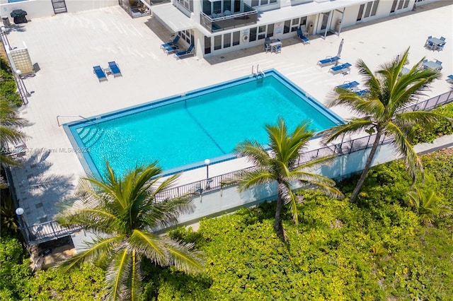 view of swimming pool with a patio area