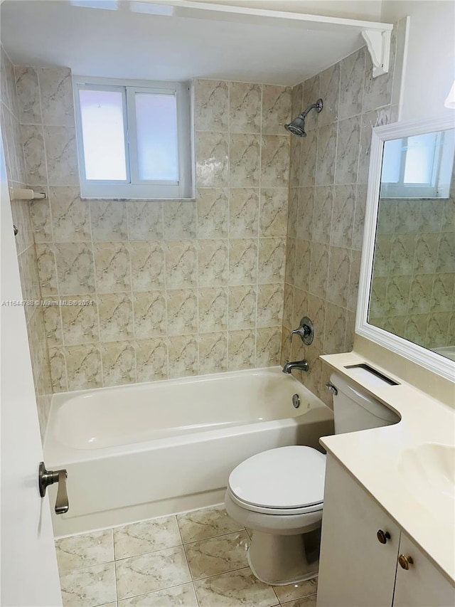 full bathroom with tiled shower / bath combo, toilet, plenty of natural light, and tile patterned floors