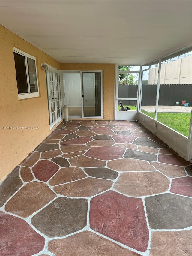 view of unfurnished sunroom