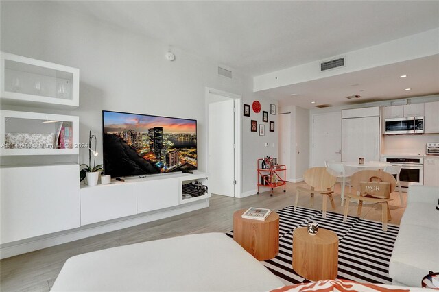 living room with light wood-type flooring