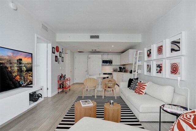 living room featuring light hardwood / wood-style floors