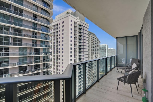 balcony featuring a city view