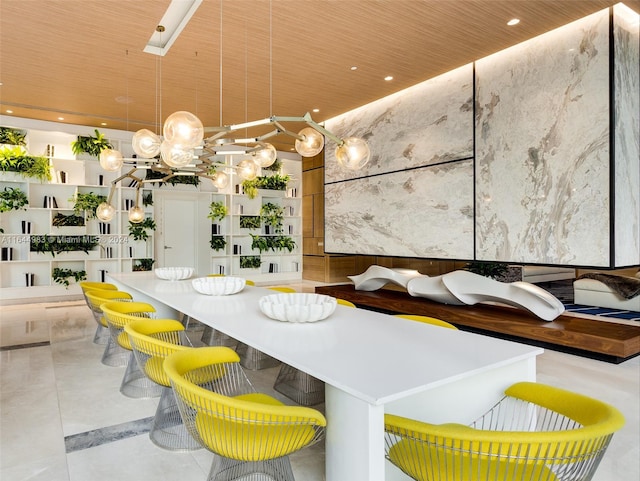 dining area featuring wooden ceiling