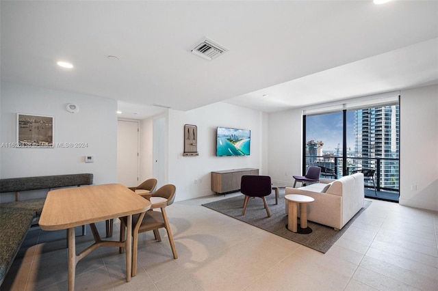 living room with a wall of windows