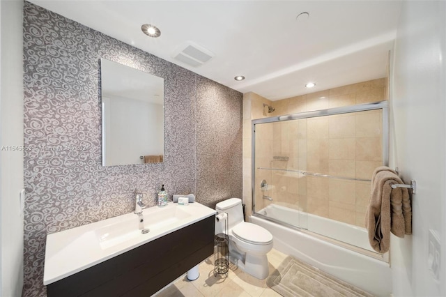 full bathroom featuring toilet, recessed lighting, shower / bath combination with glass door, vanity, and visible vents