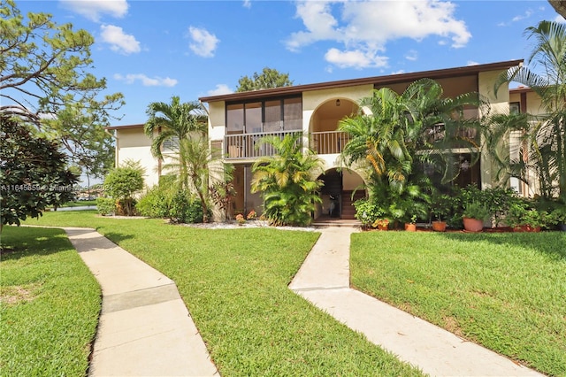 view of front of property with a front yard