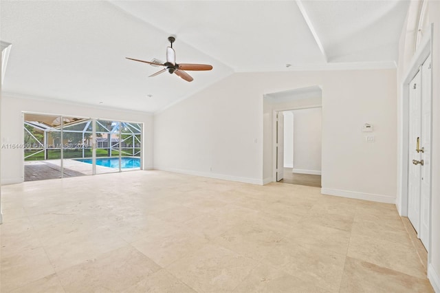 unfurnished living room featuring lofted ceiling, ceiling fan, and crown molding