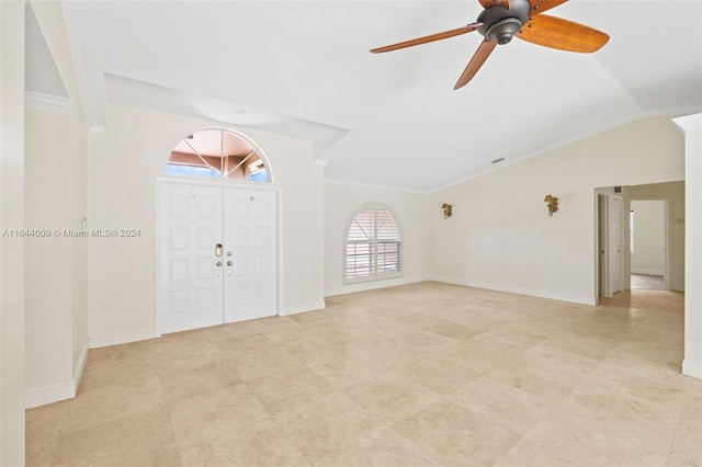 interior space featuring ceiling fan, lofted ceiling, and crown molding