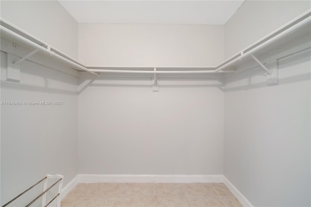 walk in closet featuring tile patterned floors