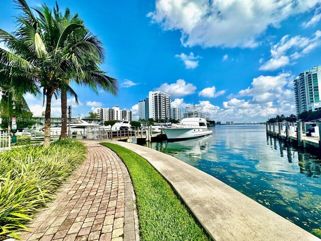 exterior space with a water view