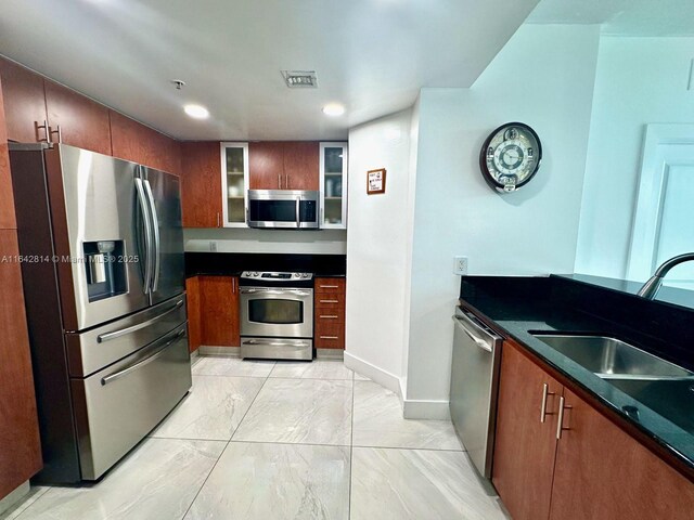 kitchen featuring sink and appliances with stainless steel finishes