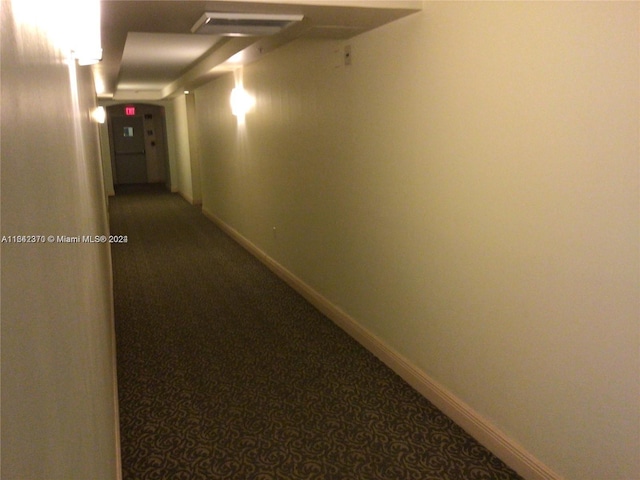 corridor with carpet floors