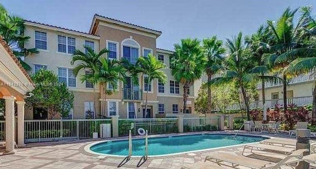 view of pool featuring a patio area