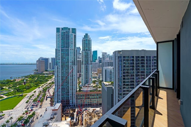 balcony featuring a water view