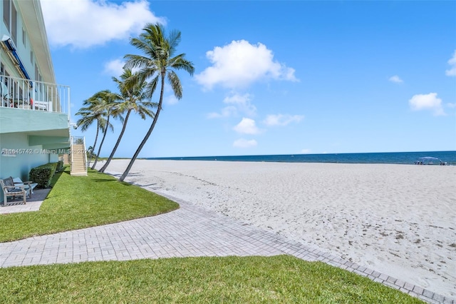 property view of water featuring a beach view