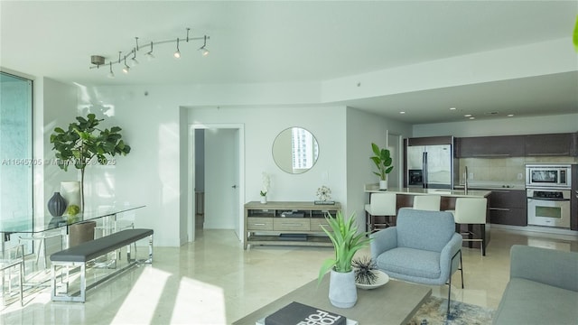 living room featuring sink