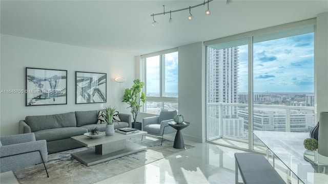 living room with a wall of windows