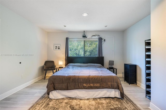 bedroom featuring light hardwood / wood-style flooring