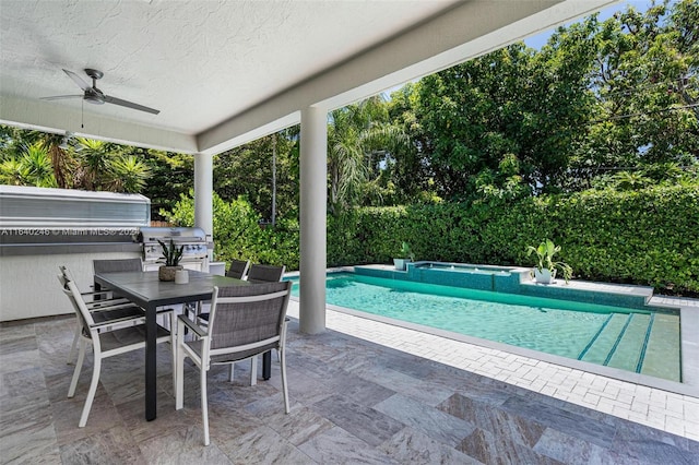 view of pool with ceiling fan and a patio