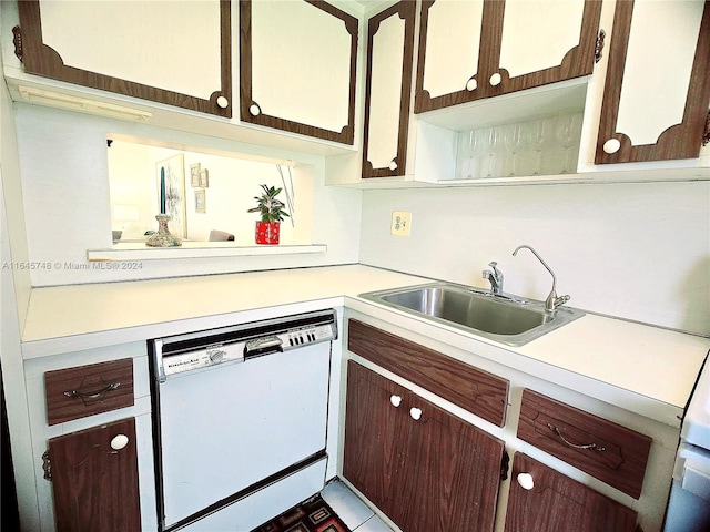 kitchen with sink, tile patterned flooring, and dishwasher