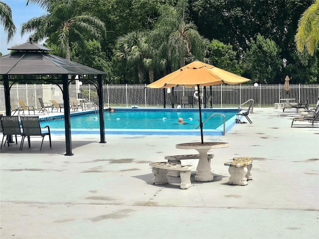 view of pool featuring a patio area and a gazebo