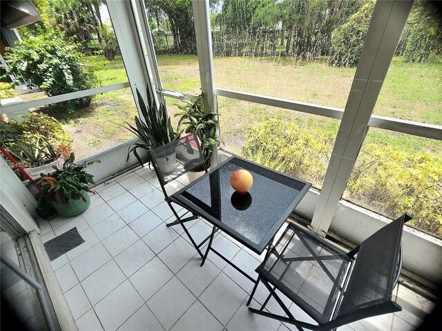 sunroom featuring plenty of natural light