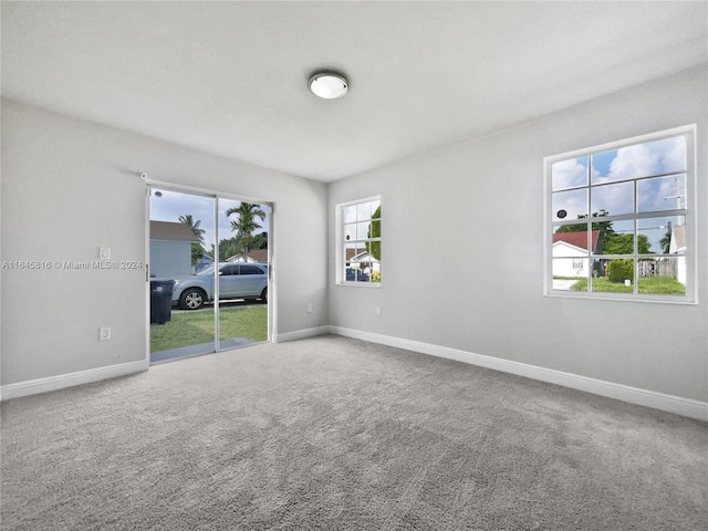 empty room with carpet flooring