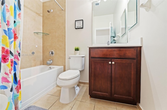 full bathroom with vanity, shower / tub combo, toilet, and tile patterned floors