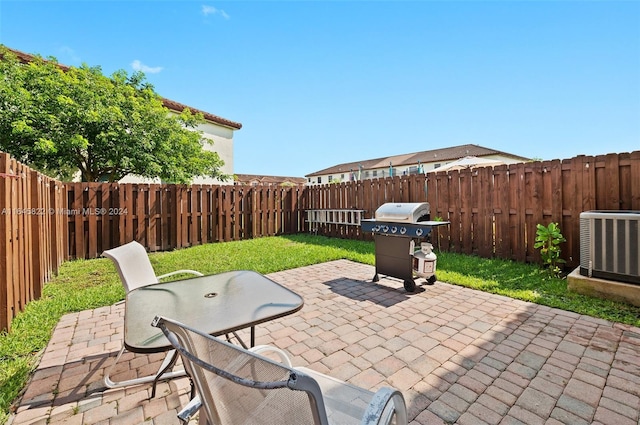 view of patio / terrace with grilling area and central AC unit