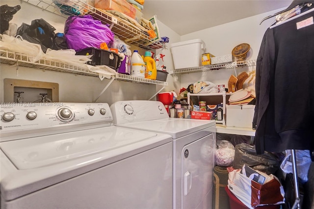 laundry area with separate washer and dryer