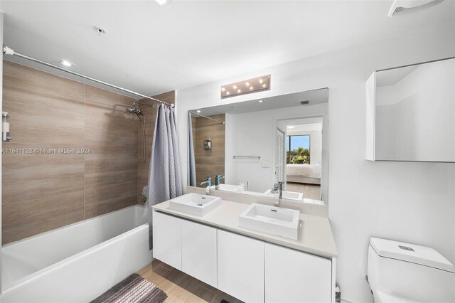 1600 SW 1st Ave Unit 614, Miami, FL 33129 - full bath with toilet, shower / tub combo with curtain, a sink, and double vanity
