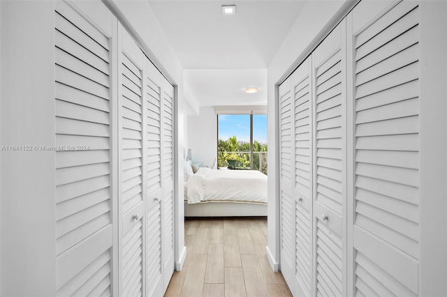 hallway featuring light hardwood / wood-style flooring