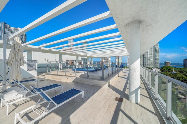 1600 SW 1st Ave Unit 614, Miami, FL 33129 - view of patio / terrace with a pergola and a water view