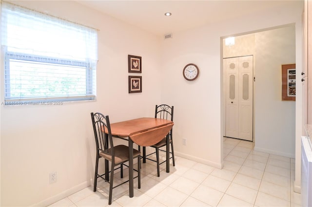 view of tiled dining space