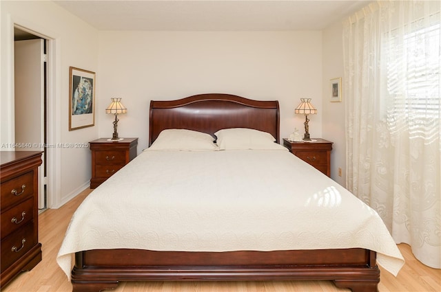 bedroom featuring light wood-type flooring