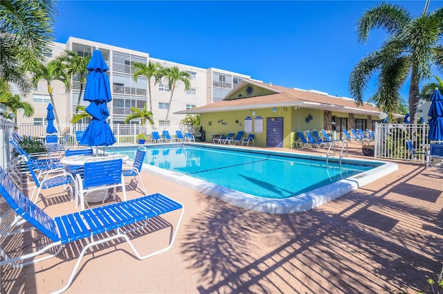 view of swimming pool with a patio area