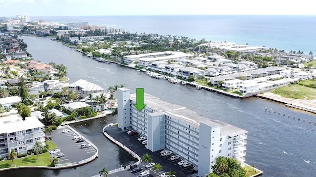 birds eye view of property featuring a water view