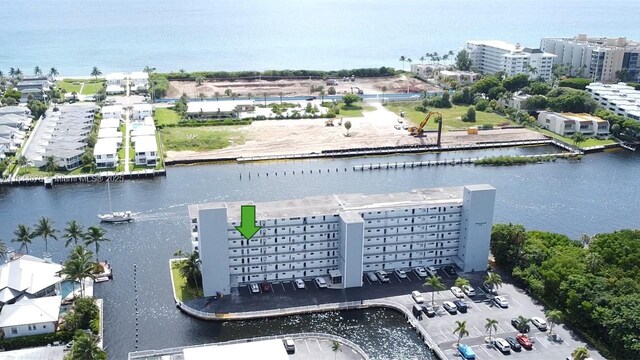 aerial view with a view of the beach and a water view