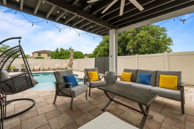 view of patio / terrace featuring a fenced in pool