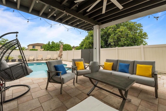 view of patio with a fenced in pool, a fenced backyard, and an outdoor hangout area