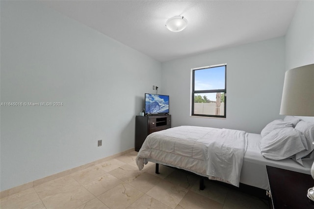 view of tiled bedroom