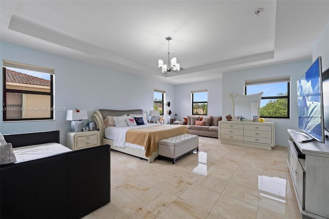 tiled bedroom featuring a raised ceiling and an inviting chandelier