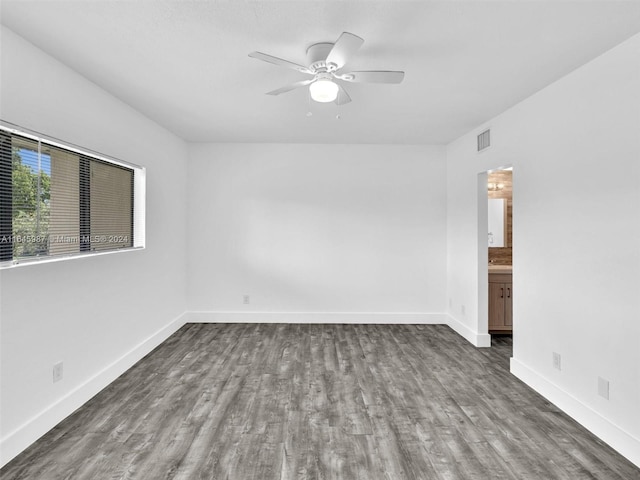 unfurnished room featuring hardwood / wood-style flooring and ceiling fan