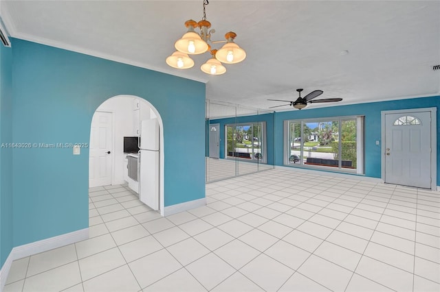 interior space with ceiling fan with notable chandelier, ornamental molding, and light tile patterned flooring