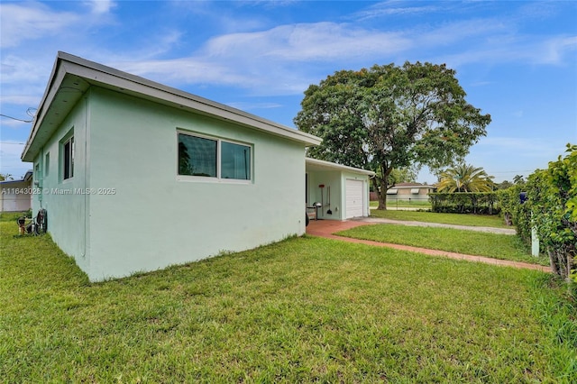 view of home's exterior featuring a lawn