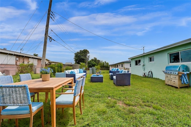 view of yard with outdoor lounge area