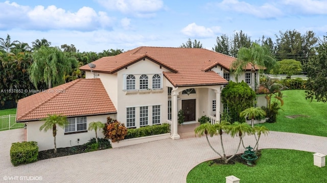 view of front of home with a front lawn