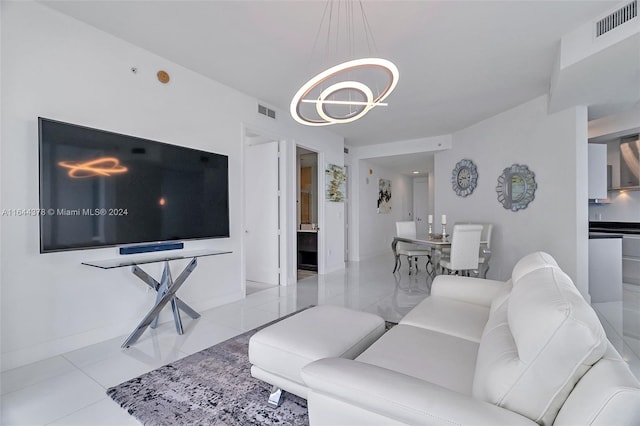 living room with light tile patterned floors